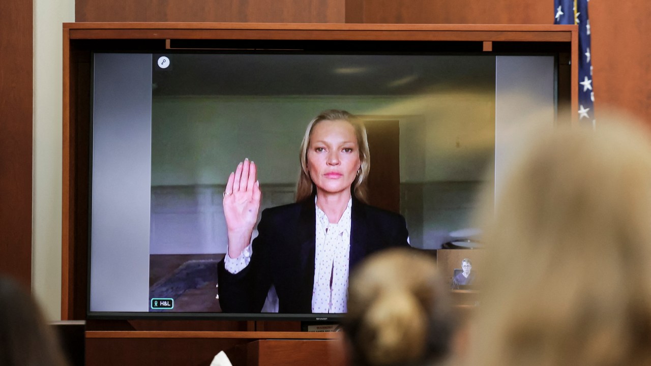 Model Kate Moss is sworn in via video link at the Fairfax County Circuit Courthouse in Fairfax, Virginia, on May 25, 2022. - Actor Johnny Depp is suing ex-wife Amber Heard for libel after she wrote an op-ed piece in The Washington Post in 2018 referring to herself as a public figure representing domestic abuse. (Photo by EVELYN HOCKSTEIN / POOL / AFP)
