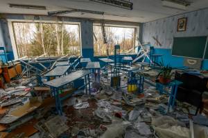 A destroyed classroom inside a school damaged by shelling russian army in the Kukhari village, Ukraine, Kyiv area, Ukraine, April 16, 2022 (Photo by Maxym Marusenko/NurPhoto via Getty Images)