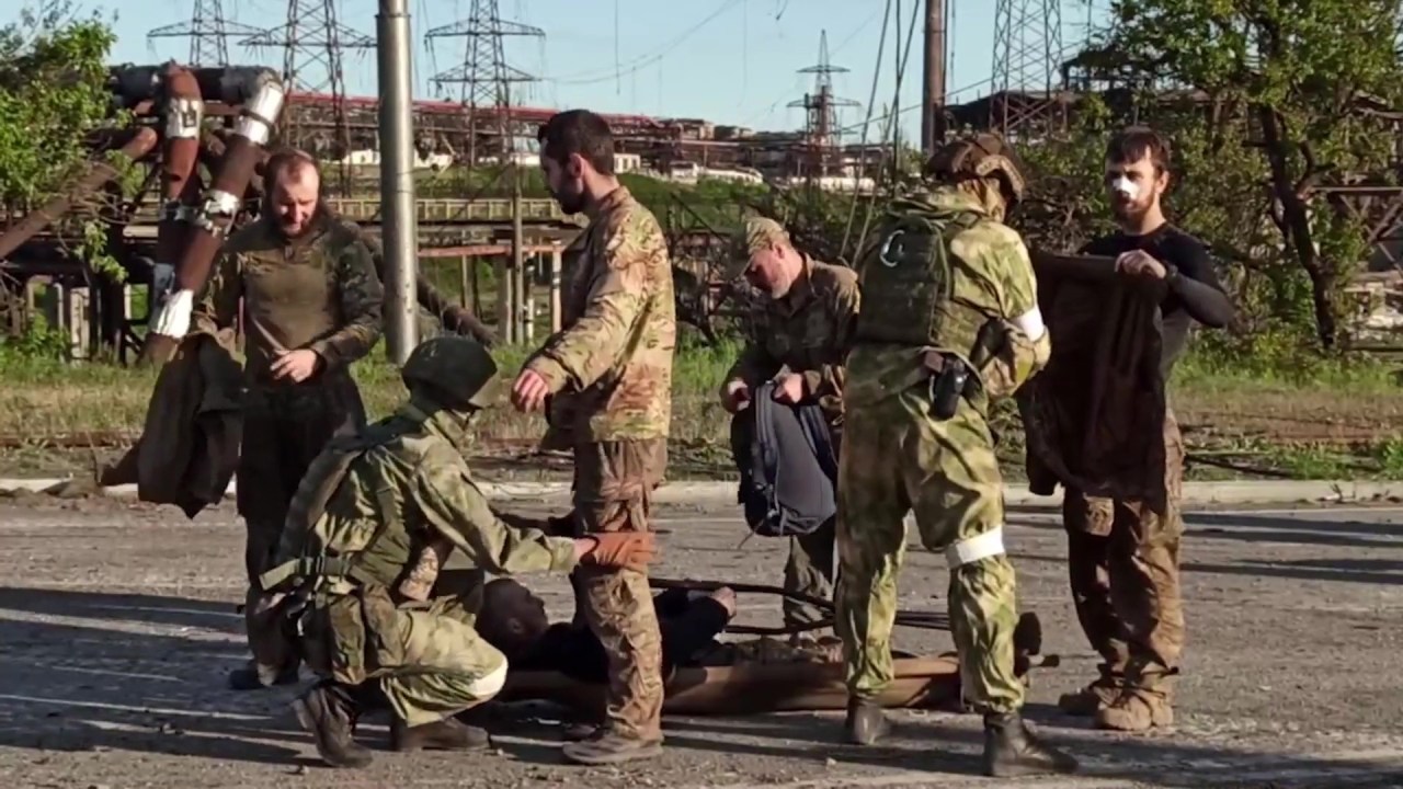 MARIUPOL, UKRAINE - MAY 17: (----EDITORIAL USE ONLY - MANDATORY CREDIT - RUSSIAN DEFENSE MINISTRY/ HANDOUT" - NO MARKETING NO ADVERTISING CAMPAIGNS - DISTRIBUTED AS A SERVICE TO CLIENTS----) A screen grab taken from a video released by Russian Defense Ministry shows Ukrainian soldiers are being evacuated from Azovstal steel plant in the port city of Mariupol, Ukraine on May 17, 2022. A total of 264 Ukrainian soldiers, including 53 seriously wounded personnel, have been evacuated from the Azovstal steel plant in the port city of Mariupol, the Ukrainian General Staff said early Tuesday. Russia reached an agreement with besieged Ukrainian servicemen on the evacuation of the wounded at the Azovstal steel plant, the Russian Defense Ministry said Monday. "On May 16, as a result of negotiations with representatives of Ukrainian servicemen blocked on the territory of the Azovstal metallurgical plant in Mariupol, an agreement was reached on the evacuation of the wounded," the ministry said in a statement. (Photo by Russian Defense Ministry/Handout/Anadolu Agency via Getty Images)