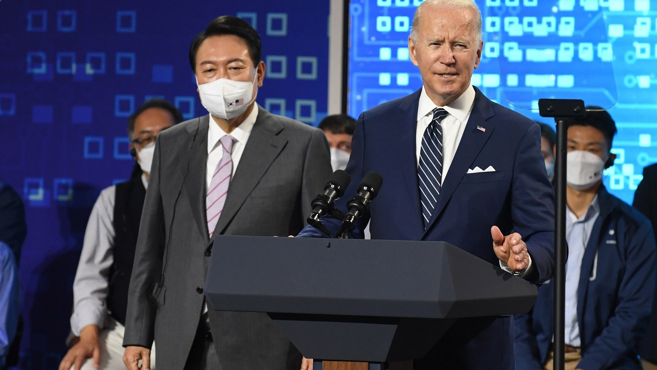 PYEONGTAEK, SOUTH KOREA - MAY 20: U.S. President Joe Biden delivers remarks with South Korean President Yoon Suk-yeol as they visit the Samsung Electronics Pyeongtaek campus on May 20, 2022 in Pyeongtaek, South Korea. President Joe Biden arrived in South Korea on Friday for his first summit with President Yoon Suk-yeol on a range of issues, including North Korea's nuclear program and supply chain risks. (Photo by Kim Min-Hee - Pool/Getty Images)