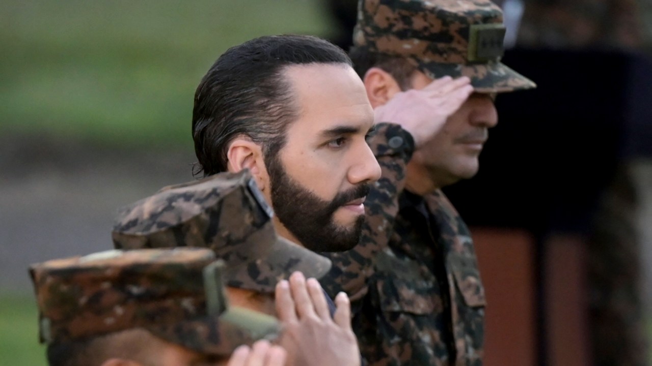 (FILES) In this file photo taken on April 04, 2022 Salvadoran President Nayib Bukele attends the graduation of new military personnel, at the Captain General Gerardo Barrios Military School, in Antiguo Cuscatlan, El Salvador, on April 4, 2022. - El Salvador's President Nayib Bukele completes three years in power in El Salvador on May 31, 2022 touting his frontal "war" on gangs as his main achievement in reducing violence, an effort that has won him local popularity. (Photo by Marvin RECINOS / AFP)