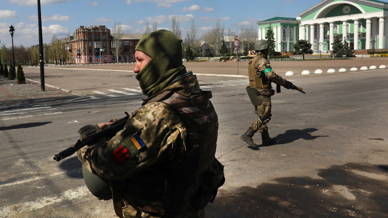 Severodonetsk, UkraineAPRIL 15, 2022Ukrainian forces guard the city center of Severodonetsk on April 15, 2022 as shelling can be heard. The Ukraine - Russia war continues in the town of Severodonetsk, where most residents have left, but a few remain on July 15, 2022. (Carolyn Cole / Los Angeles Times via Getty Images).
