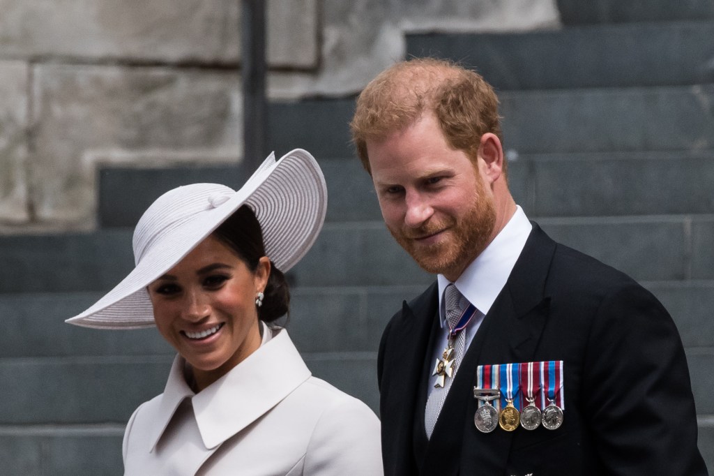 LONDON, UNITED KINGDOM - JUNE 03: Prince Harry, Duke of Sussex and Meghan, Duchess of Sussex leave St Paul's Cathedral after attending Service of Thanksgiving for The Queen's during the Platinum Jubilee celebrations in London, United Kingdom on June 03, 2022. Millions of people in the UK are set to join the four-day celebrations marking the 70th year on the throne of Britain's longest-reigning monarch, Queen Elizabeth II, with over a billion viewers expected to watch the festivities around the world. (Photo by Wiktor Szymanowicz/Anadolu Agency via Getty Images)