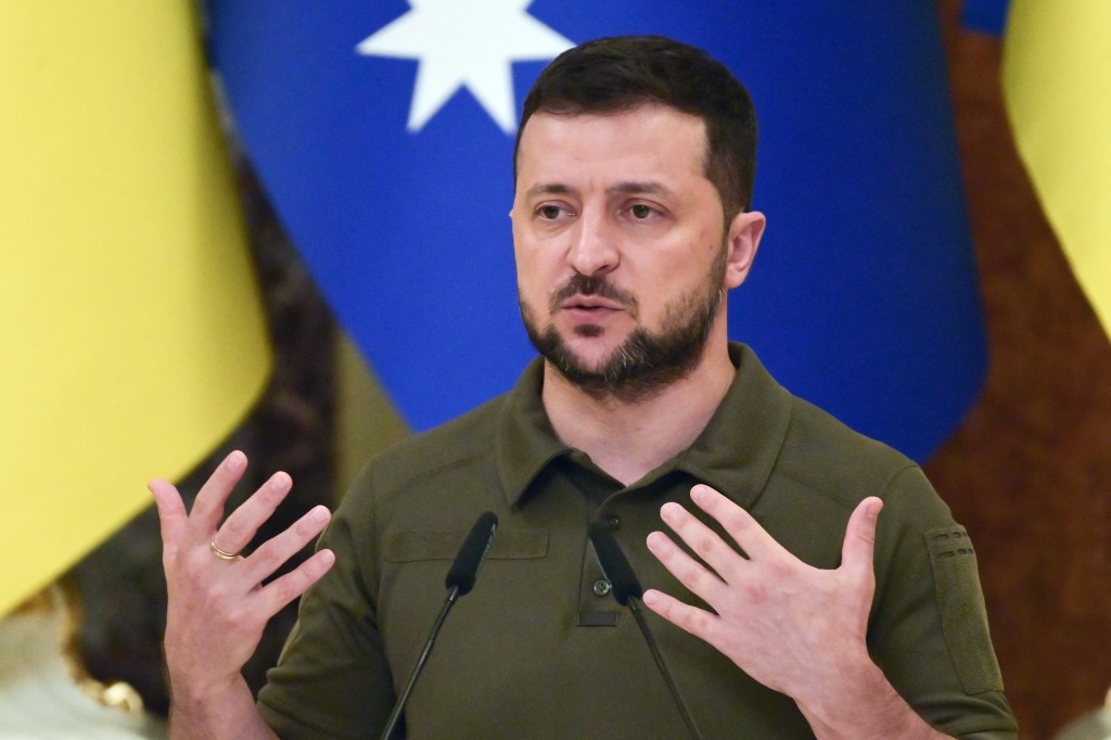 Ukrainian President Volodymyr Zelensky speaks during a joint press conference with Australia's Prime Minister at Mariynsky Palace following a meeting in Kyiv on July 3, 2022 amid the Russian invasion of Ukraine. (Photo by Miguel MEDINA / AFP)