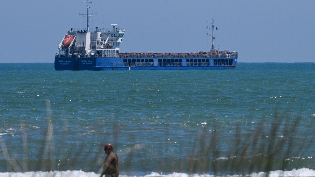 The Russian-flagged cargo ship "Zhibek Zholy" is anchored on July 5, 2022 at black sea coast of Karasu district in Sakarya. - The ship, at the centre of a diplomatic battle between Kyiv and Moscow, remained anchored off Turkey's Black Sea coast four days after its arrival. Ukraine on July 1 asked Turkey to detain a Russian-flagged cargo ship that Kyiv alleged had set off from a Kremlin-occupied port. (Photo by Ozan KOSE / AFP)