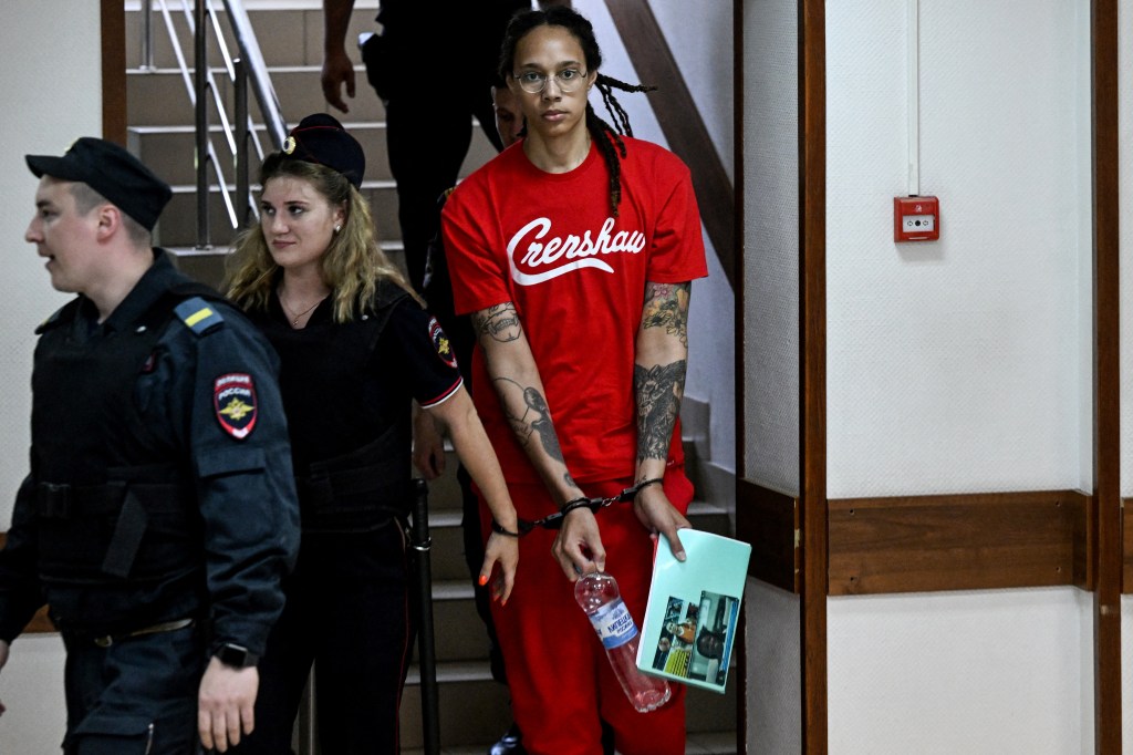 US WNBA basketball superstar Brittney Griner arrives to a hearing at the Khimki Court, outside Moscow on July 7, 2022. - Griner, a two-time Olympic gold medallist and WNBA champion, was detained at Moscow airport in February on charges of carrying in her luggage vape cartridges with cannabis oil, which could carry a 10-year prison sentence. (Photo by Kirill KUDRYAVTSEV / AFP)