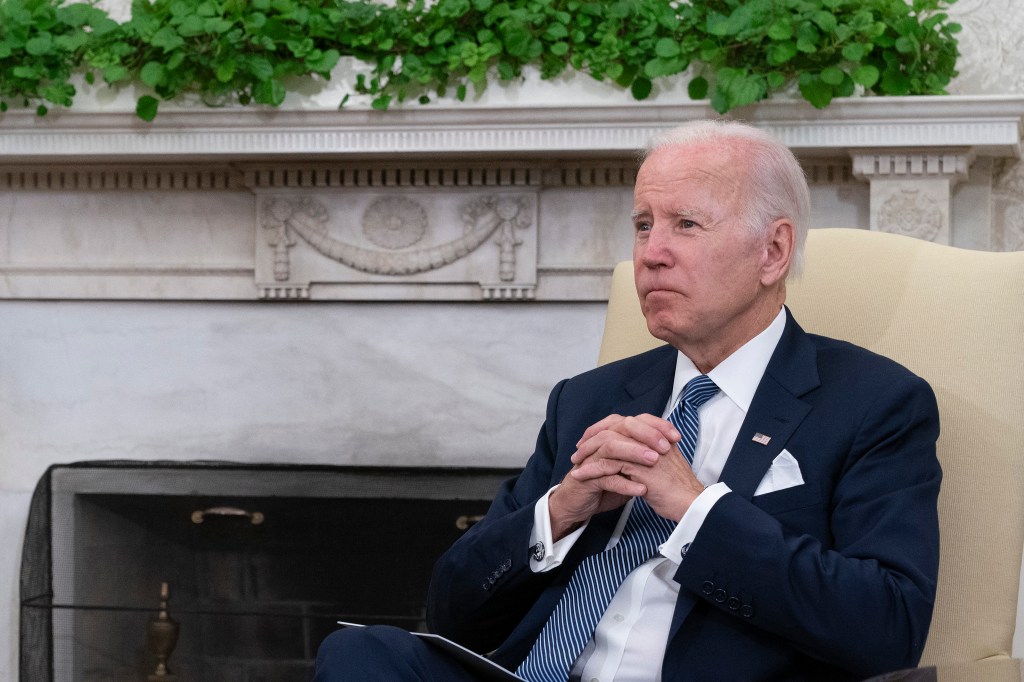 WASHINGTON, DC - JULY 12: U.S. President Joe Biden listens to Mexican President Andres Manuel Lopez Obrador as they talk to journalists in the Oval Office at the White House on July 12, 2022 in Washington, DC. This is the first meeting between the two North American leaders since Obrador did not to attend the Summit of the Americas last month in Los Angeles because the White House refused to invite leaders from Cuba, Nicaragua and Venezuela. Chris Kelponis-Pool/Getty Images/AFP (Photo by POOL / GETTY IMAGES NORTH AMERICA / Getty Images via AFP)