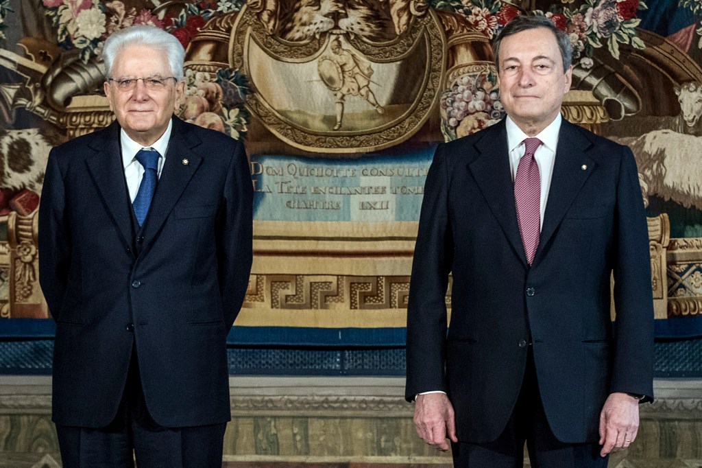 ROME, ITALY - FEBRUARY 13: Italian President Sergio Mattarella(C) and Italian Prime Minister Mario Draghi pose for a picture after the swearing-in ceremony at the Quirinal palace, on February 13, 2021 in Rome, Italy. Former President of the European Central Bank Mario Draghi was sworn in as Italy’s Prime Minister today, after the collapse of the Italian government last month. (Photo by Roberto Monaldo/AM POOL/Getty Images)