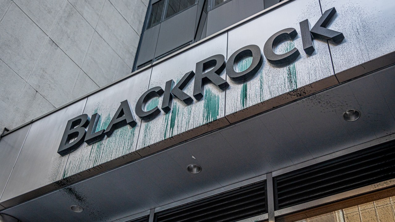 MANHATTAN, NEW YORK, UNITED STATES - 2022/05/25: BlackRock logo seen sprayed with a "coal sludge" like substance at the protest. On May 25, 2022 more than 100 New Yorkers on the frontlines of the climate crisis, including faith leaders and youth, held a protest outside BlackRock Headquarters in Manhattan, where their annual shareholders meeting took place. Participants and speakers at this event demanded that BlackRock exclude companies expanding fossil fuel production from its active and passive funds. At least fourteen protesters were arrested, including six faith leaders.(Photo by Erik McGregor). (Photo by Erik McGregor/LightRocket via Getty Images)