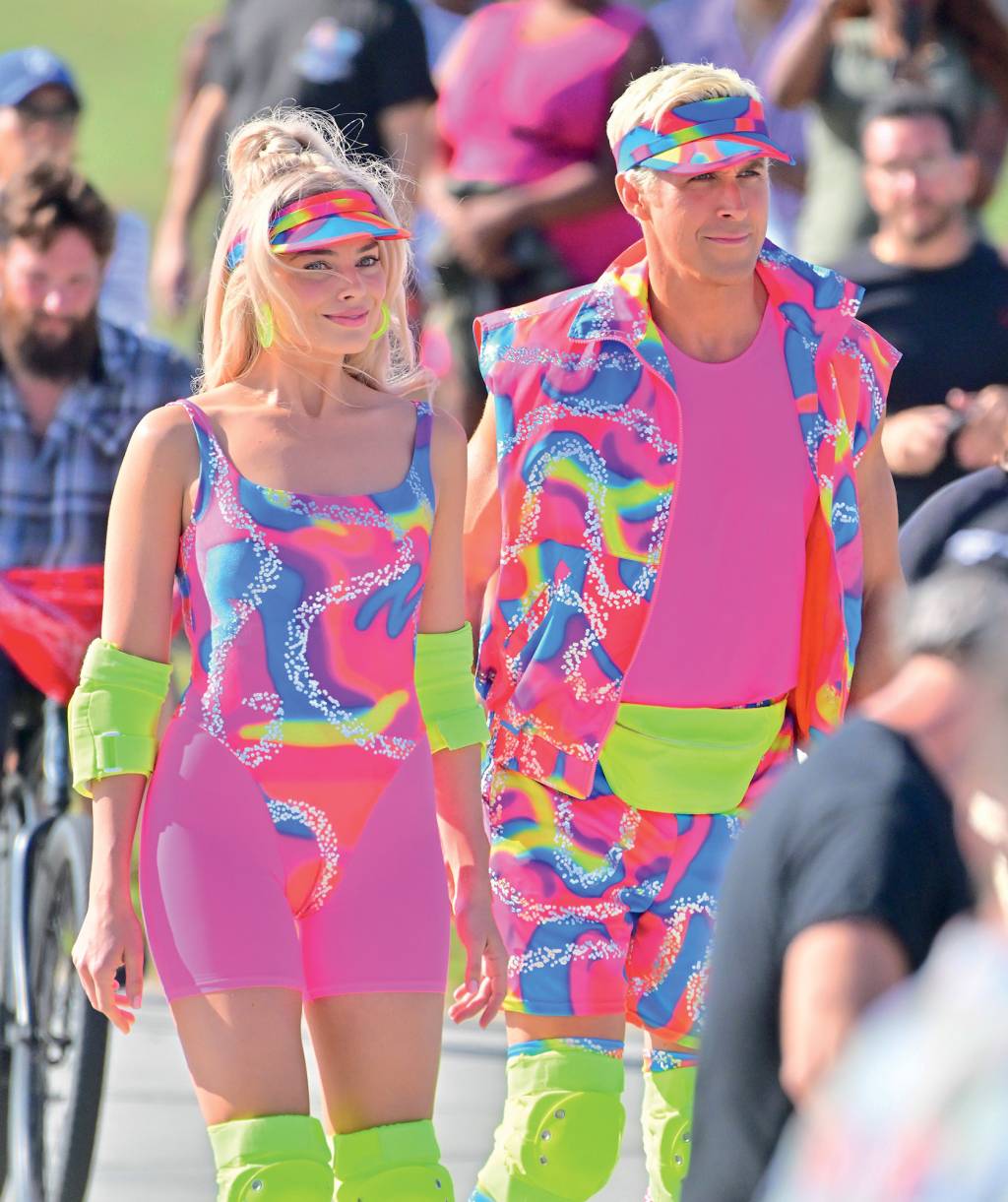 LOS ANGELES CA - JUNE 27: Margot Robbie and Ryan Gosling on rollerblades film new scenes for 'Barbie' in Venice California. 27 Jun 2022. (Photo by MEGA/GC Images)
