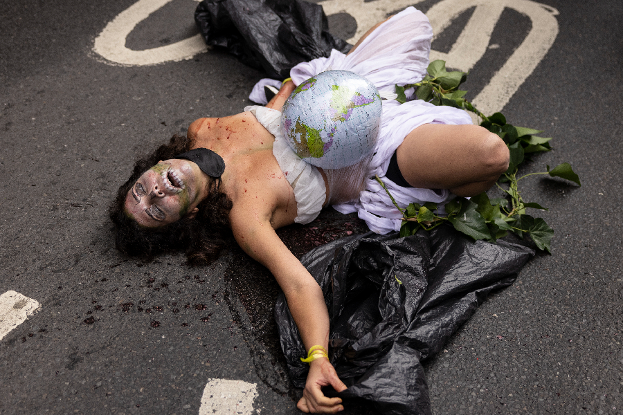 Extinction Rebellion protesters gather outside the Brazilian Embassy to protest for indigenous rights in the Amazon, on August 25, 2021 in London, United Kingdom.