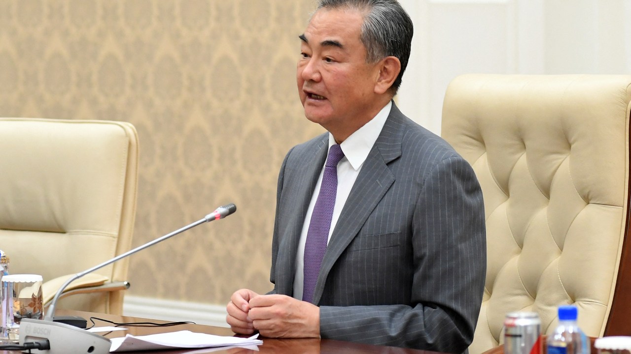 This handout photo taken and released by Cambodia's Government Cabinet on August 3, 2022 shows China's Foreign Minister Wang Yi speaking during a meeting with Cambodia's Prime Minister Hun Sen at the Peace Palace in Phnom Penh. (Photo by Kok KY / CAMBODIA'S GOVERNMENT CABINET / AFP) / RESTRICTED TO EDITORIAL USE - MANDATORY CREDIT "AFP PHOTO/ CAMBODIA'S GOVERNMENT CABINET/ KOK KY " - NO MARKETING NO ADVERTISING CAMPAIGNS - DISTRIBUTED AS A SERVICE TO CLIENTS