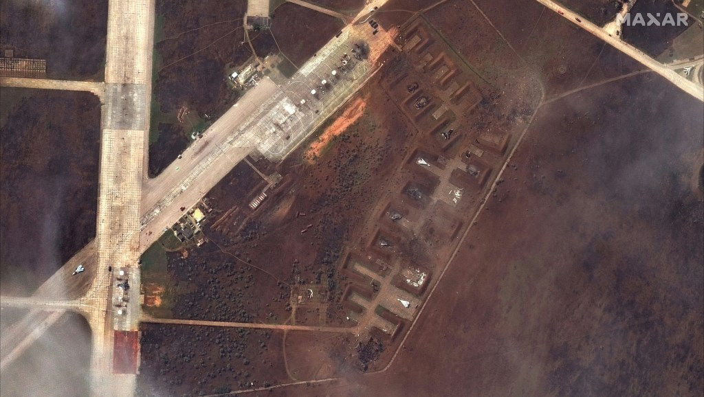 his handout satellite image courtesy of Maxar Technologies released on August 11, 2022 shows the aftermath of the reported attack on the Saki airbase at Novofedorivka, Crimea. - Moscow insisted that major blasts at a key military airbase on the Russian-annexed Crimea peninsula were caused by exploding ammunition rather than Ukrainian fire. (Photo by Satellite image ©2022 Maxar Technologies / AFP) / RESTRICTED TO EDITORIAL USE - MANDATORY CREDIT "AFP PHOTO / Satellite image ©2022 Maxar Technologies" - NO MARKETING NO ADVERTISING CAMPAIGNS - DISTRIBUTED AS A SERVICE TO CLIENTS