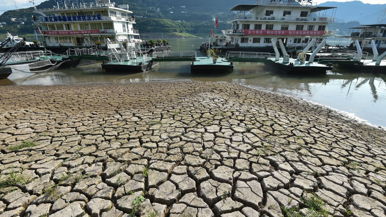This photo taken on August 16, 2022 shows a section of a parched river bed along the Yangtze River in China's southwestern Chongqing. (Photo by AFP) / China OUT