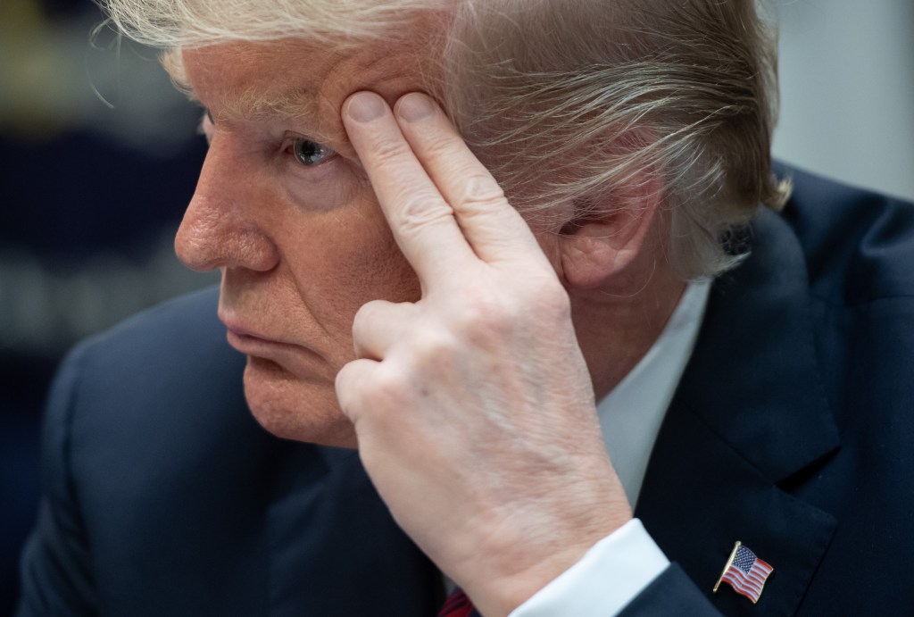 US President Donald Trump listens during a meeting on drug trafficking on the Southern Border of the US in the Roosevelt Room of the White House in Washington, DC, March 13, 2019. (Photo by SAUL LOEB / AFP)