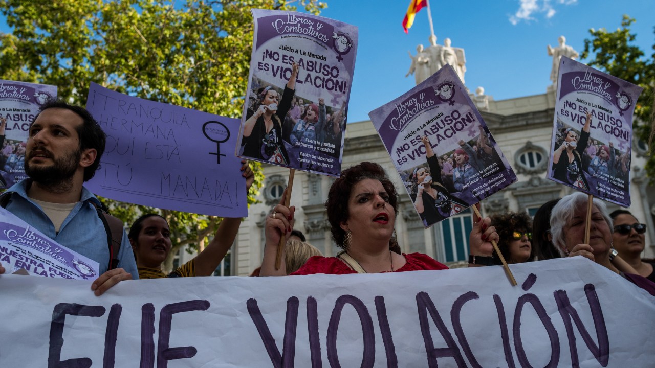 MADRID, SPAIN - 2019/06/21: People hold a banner with the words 'it was rape' during a protest in front of the Supreme Court. Today Supreme Court of Spain found guilty of rape the five men known as 'La Manada' (The wolf pack). (Photo by Marcos del Mazo/LightRocket via Getty Images)