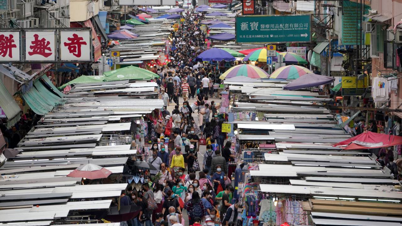 HONG KONG, CHINA - APRIL 18: People wearing face masks visit Mongkok Fa Yuen Street amid the coronavirus outbreak on April 18, 2020 in Hong Kong, China. (Photo by Zhang Wei/China News Service via Getty Images)