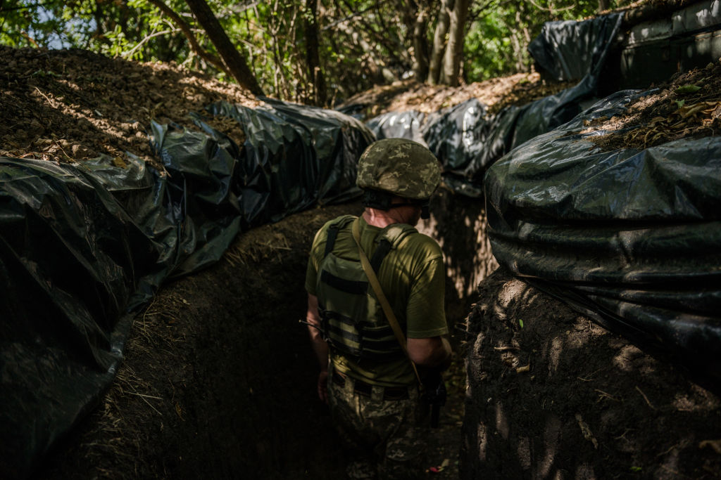 MYKOLAIV REGION, UKRAINE - AUGUST 8: A soldier, call sign Petrovich, stands in trenches on the Kherson frontline in Mykolaiv region, Ukraine, 8th of August 2022. (Photo by Wojciech Grzedzinski / For The Washington Post via Getty Images)