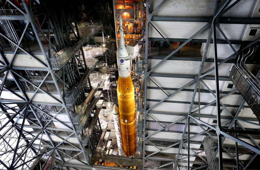 The Artemis 1 moonshot rocket, carrying the Orion spacecraft, shortly before rollout to the launch pad â as seen from the high bay level inside the Vehicle Assembly Building â at Kennedy Space Center, Florida, Launch Complex 39 on Aug. 16, 2022. Artemis 1 is scheduled to launch an unmanned mission to orbit the moon on Aug. 29. (Joe Burbank/Orlando Sentinel/Tribune News Service via Getty Images)