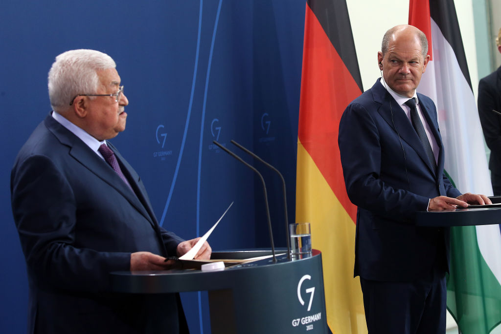 16 August 2022, Berlin: German Chancellor Olaf Scholz (SPD) and Mahmoud Abbas, President of the Palestinian Authority, answer questions from journalists at a press conference after their talks. Photo: Wolfgang Kumm/dpa (Photo by Wolfgang Kumm/picture alliance via Getty Images)