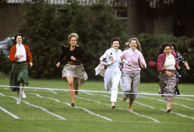 LONDON, ENGLAND - JUNE 11: Diana, Princess of Wales, runs barefoot as she takes part in the Mother's race during Prince Harry's school sports day in Richmond on June 11, 1991 in London, United Kingdom. (Photo by Anwar Hussein/WireImage)