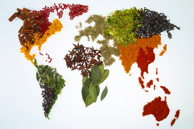 World map with spices and herbs