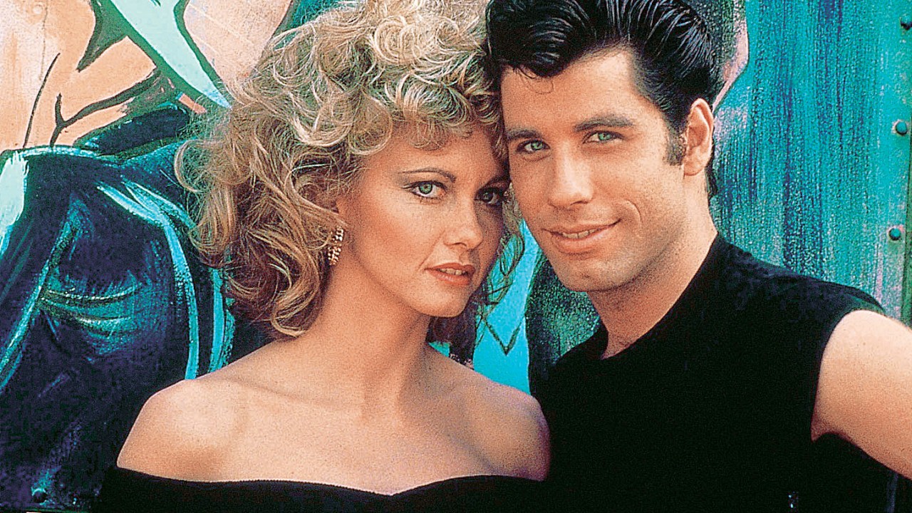 MÚLTIPLA - Olivia Newton-John com Travolta em Grease: uma de suas versões -