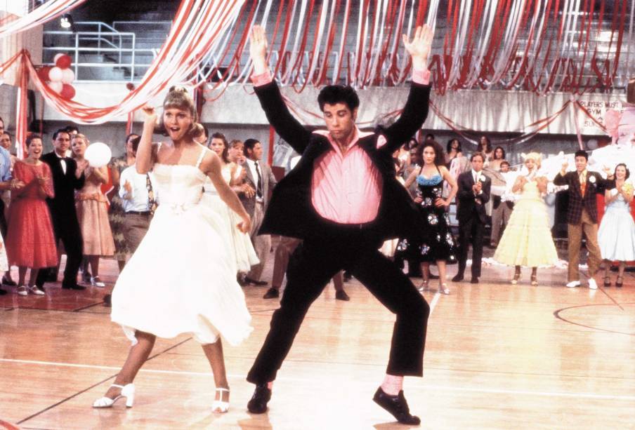 A atriz e cantora anglo-australiana Olivia Newton-John e John Travolta no filme "Grease - Nos Tempos da Brilhantina", de Randal Kleiser. 1977.