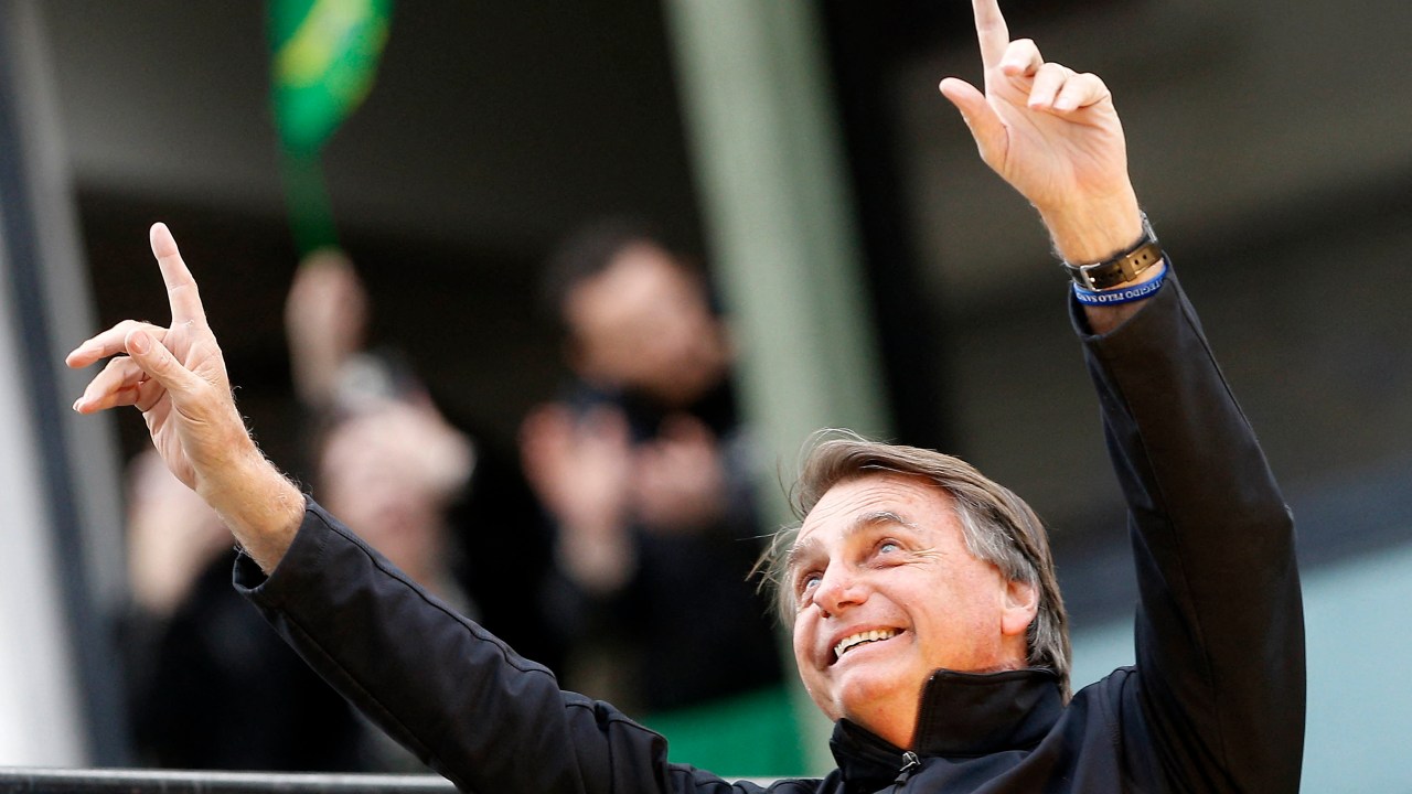 Brazil's President and presidential candidate Jair Bolsonaro gestures during a rally as part of his re-election campaign in Curitiba, Parana State, Brazil, on August 31, 2022. (Photo by albari rosa / AFP)