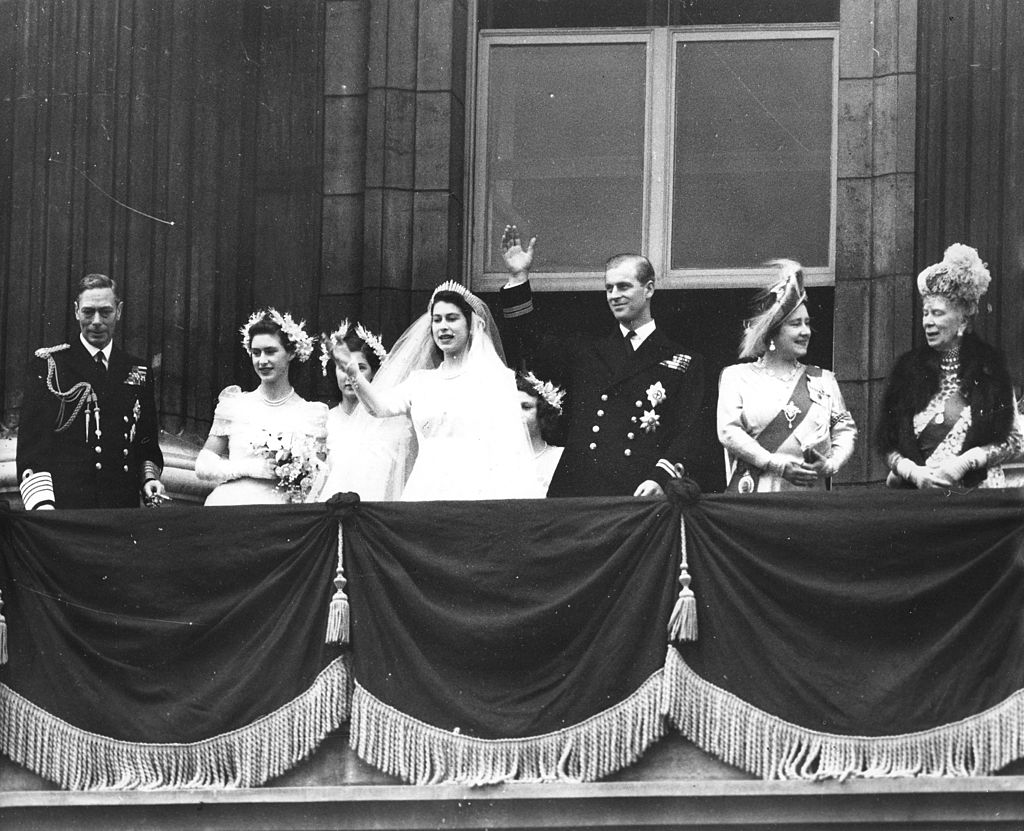 The Royal Wedding Party wave from the balcony of the Buckingham Palace, London, England, November 20, 1947. Front row, from left, King George VI (1895 - 1952), Princess Margaret (1930 - 2002), then-Princess Elizabeth (later Queen Elizabeth II), the Duke of Edinburgh, Queen Elizabeth (1900 - 2002), and Queen Mary (the Queen Mother) (18671953). (Photo by PhotoQuest/Getty Images)