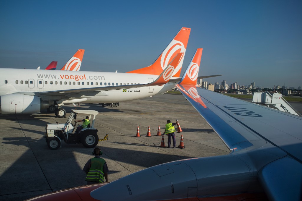 SAO PAULO, BRAZIL - 2019/04/04: Congonhas airport operation, ground crew works at aircraft landing area managing taxiway signs ( airport guidance signs ) by providing direction and information to taxiing aircraft and airport vehicles - Gol airlines. (Photo by Ricardo Funari/Brazil Photos/LightRocket via Getty Images)