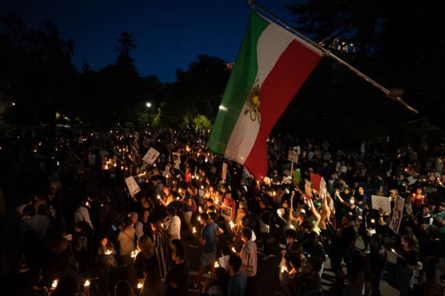 BERKELEY, CA - SEPTEMBER 23: Almost a thousand of people are gathered outside of Wheeler Hall Auditorium of UC Berkeley in California, United States on September 23, 2022 to protest Iranian government after the death of a 22-year-old Mahsa Amini under custody in Tehran, Iran. (Photo by Tayfun Coskun/Anadolu Agency via Getty Images)