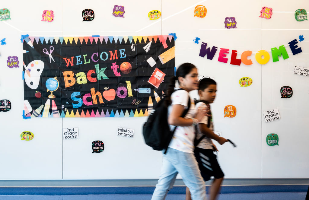 ANAHEIM, CA - August 11: Students walk to class during the first day of school at Sunkist Elementary School in Anaheim, CA on Thursday, August 11, 2022. Anaheim Elementary School District (AESD), the second largest elementary school district in the state, serves 15,000 students on 24 campuses. (Photo by Paul Bersebach/MediaNews Group/Orange County Register via Getty Images)
