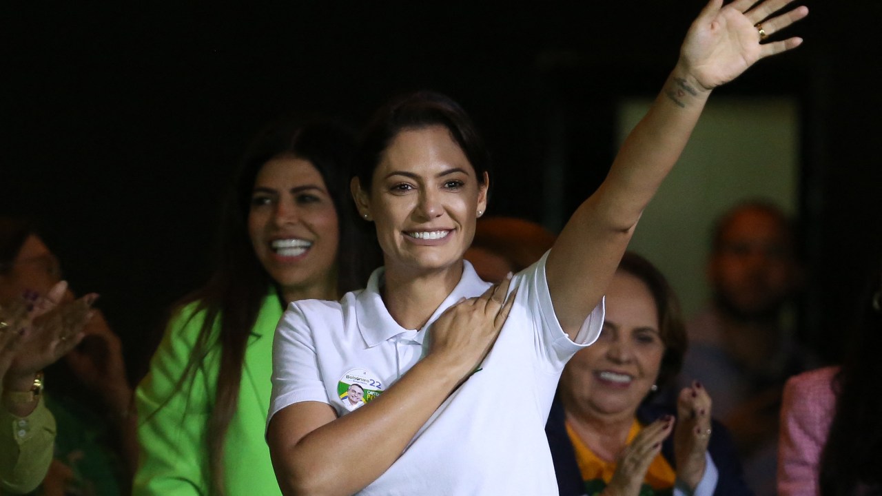 Brazil's First Lady Michelle Bolsonaro greets supporters during an event called "Women for Brazil" in Manaus, Amazonas state, Brazil, on October 11, 2022. (Photo by Michael DANTAS / AFP)