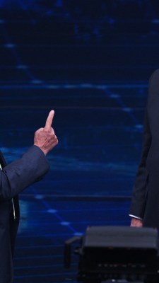Brazilian former president (2003-2010) and presidential candidate for the leftist Workers Party (PT), Luiz Inacio Lula da Silva (L), and Brazilian President and presidential candidate Jair Bolsonaro (R) gesture during a televised presidential debate in Sao Paulo, Brazil, on October 16, 2022. - President Jair Bolsonaro and former President Luiz Inácio Lula da Silva face each other this Sunday night in the first face-to-face debate, in which they will try to take advantage 14 days before the second round of the presidential elections in Brazil. (Photo by NELSON ALMEIDA / AFP)