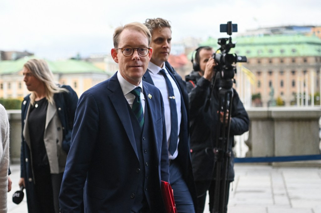 New Minister of Foreign Affairs Tobias Billstrom arrives for a group photo in front of the Parliament in Stockholm, on October 18, 2022.