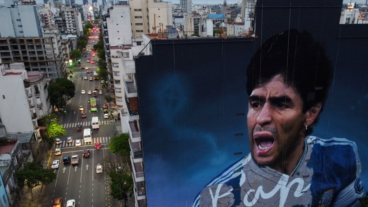Aerial view of a mural of the late Argentine football star Diego Maradona by artist Martin Ron, on October 19, 2022 in Buenos Aires, Argentina. - The mural will be finished and presented for the football star birthday next October 30. (Photo by Luis ROBAYO / AFP)