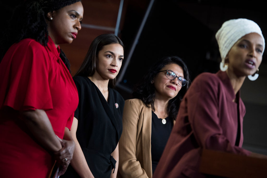 UNITED STATES - JULY 15: From left, Reps. Ayanna Pressley, D-Mass., Alexandria Ocasio-Cortez, D-N.Y., Rashida Tlaib, D-Mass., and Ilhan Omar, D-Minn., conduct a news conference in the Capitol Visitor Center responding to negative comments by President Trump that were directed the freshman House Democrats on Monday, July 15, 2019. (Photo By Tom Williams/CQ Roll Call)