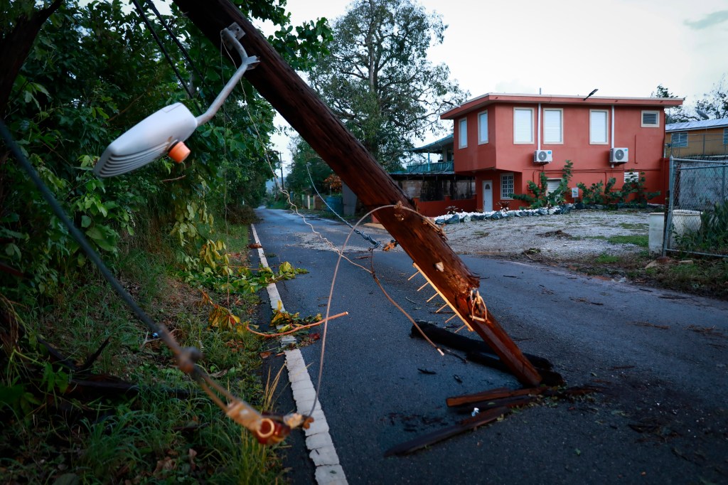 CABO ROJO, PUERTO RICO - SEPTEMBER 20: View of a downed electricity pole on September 20, 2022 in Cabo Rojo, Puerto Rico. Although little damage to the electrical grid was visible, over one million people are still withouth electricity two days after Hurricane Fiona struck this Caribbean nation. (Photo by Jose Jimenez/Getty Images)