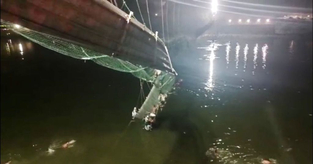 GUJARAT, INDIA - OCTOBER 30: A view of the site after a suspension bridge collapses in Indiaâs Gujarat state on October 30, 2022. Hundreds plunged into river after the bridge collapsed. (Photo by Stringer/Anadolu Agency via Getty Images)
