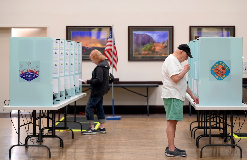 LAS VEGAS, NEVADA - OCTOBER 22: Voters cast their ballots on the first day of in-person early voting at Desert Vista Community Center on October 22, 2022 in Las Vegas, Nevada. Early voting for the general election continues through November 4. (Photo by David Becker/Getty Images)