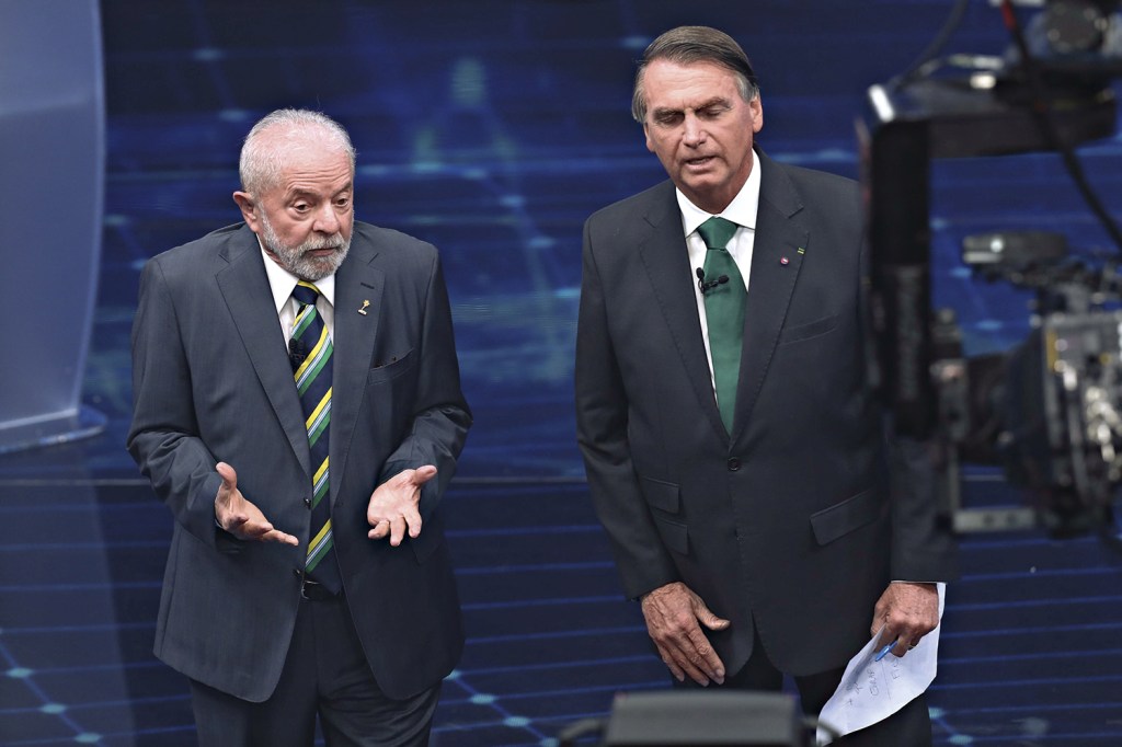 RETÓRICA DE PALANQUE - Lula e Bolsonaro em debate: ambos fazem promessas bilionárias para o ano que vem -