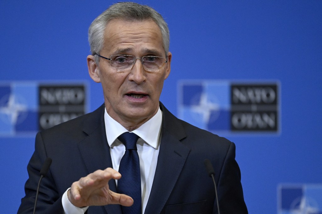 NATO Secretary General Jens Stoltenberg gestures as he addresses media after a meeting of the North Atlantic Council, following yesterday's explosion in Eastern Poland close to the border with Ukraine, at the Nato headquarters in Brussels on November 16, 2022. - Stoltenberg said on November 16, 2022 the deadly explosion in Poland was probably the result of Ukrainian anti-aircraft fire but that Russia bears "ultimate responsibility" for the war. (Photo by John THYS / AFP)