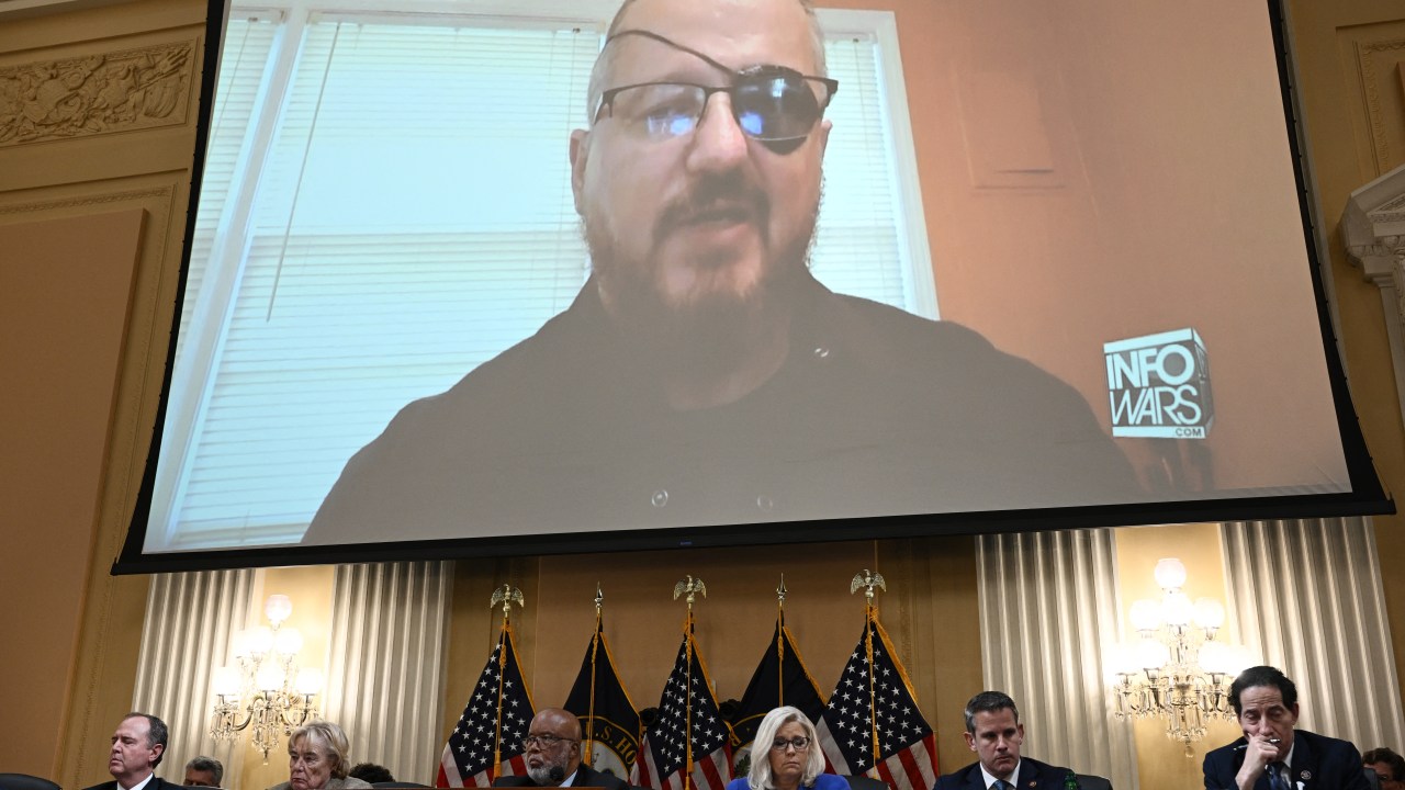 (FILES) In this file photo taken on June 9, 2022 Stewart Rhodes, founder of the Oath Keepers, is seen on a screen during a House Select Committee hearing to Investigate the January 6th Attack on the US Capitol, in the Cannon House Office Building on Capitol Hill in Washington, DC. - Stewart Rhodes, founder of the far-right Oath Keepers militia, was found guilty of sedition on November 29, 2022 for his role in the January 6, 2021 attack on the US Capitol by supporters of former president Donald Trump. (Photo by Brendan SMIALOWSKI / AFP)
