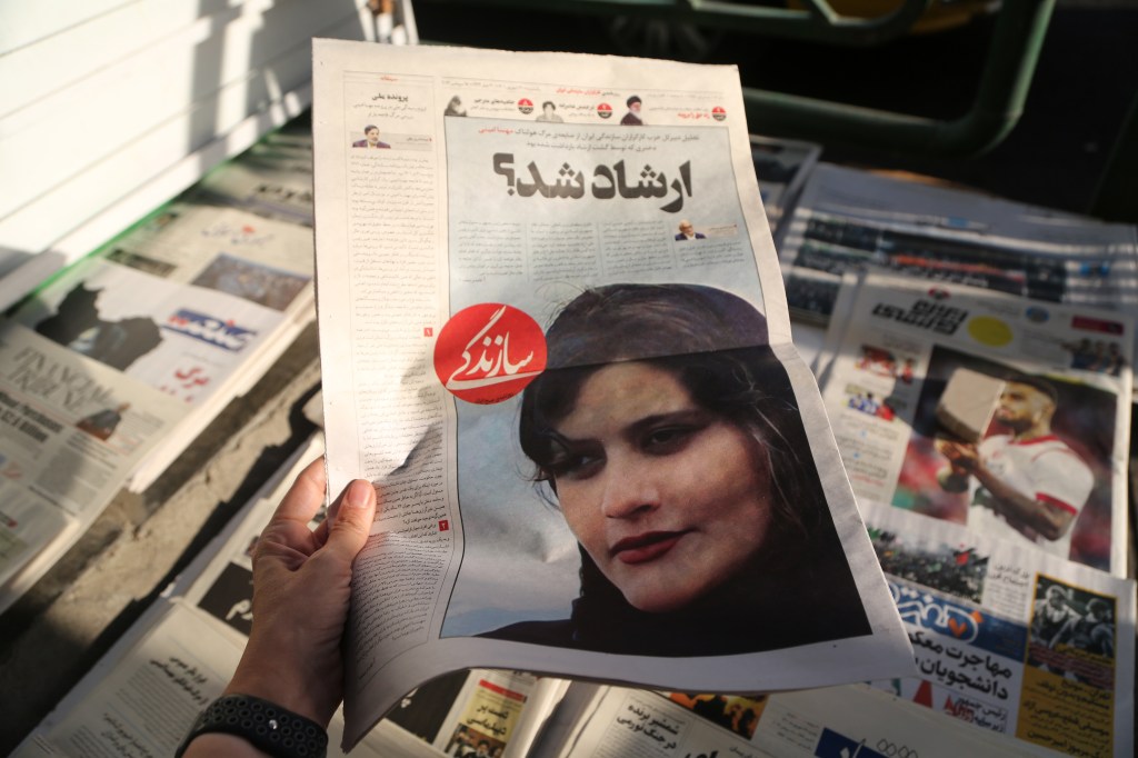 TEHRAN, IRAN - SEPTEMBER 18: A view of Iranian newspapers with headlines of the death of 22 years old Mahsa Amini who died after being arrested by morality police allegedly not complying with strict dress code in Tehran, Iran on September 18, 2022. (Photo by Fatemeh Bahrami/Anadolu Agency via Getty Images)