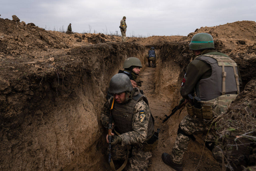 MYKOLAIV, UKRAINE - 2022/11/09: Ukrainian soldiers from the 63 brigade are seen having military training simulating an attack in the trenches for the counteroffensive to recapture Kherson. The training, which involves 31 soldiers, aims to improve combat skills on the battlefield. Russia's military has been ordered to withdraw from the southern Ukrainian city of Kherson, pulling out from the western bank of the Dnipro River entirely. It marks significance as the regional capital has been captured since the invasion in February 2022. (Photo by Ashley Chan/SOPA Images/LightRocket via Getty Images)