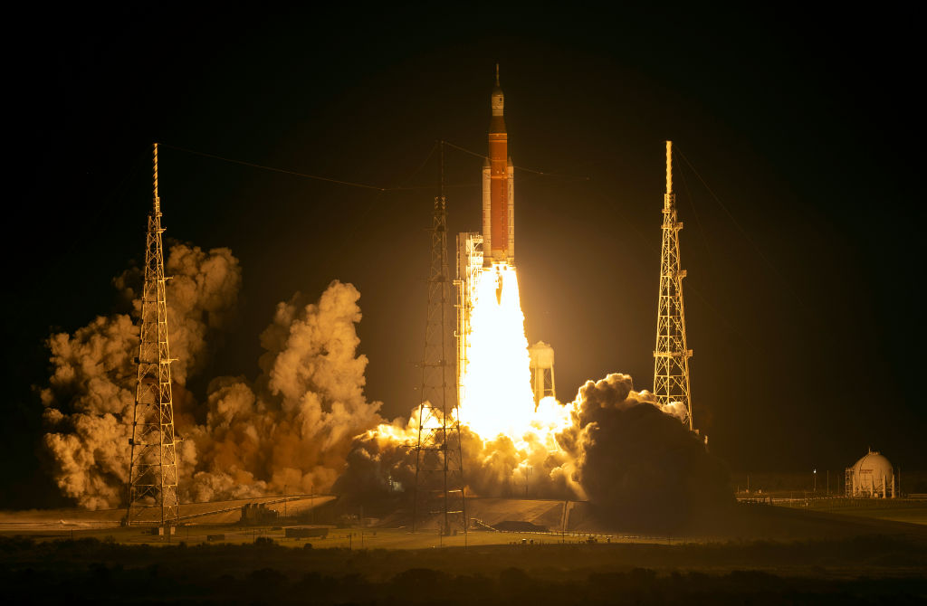 CAPE CANAVERAL, FLORIDA - NOVEMBER 16: NASA’s Artemis I Space Launch System (SLS) rocket, with the Orion capsule attached, launches at NASA's Kennedy Space Center on November 16, 2022 in Cape Canaveral, Florida. The Artemis I mission will send the uncrewed spacecraft around the moon to test the vehicle's propulsion, navigation and power systems as a precursor to later crewed mission to the lunar surface. (Photo by Kevin Dietsch/Getty Images)