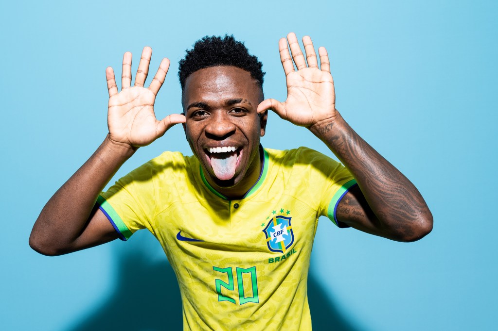 DOHA, QATAR - NOVEMBER 20: Vinicius Junior of Brazil poses during the official FIFA World Cup Qatar 2022 portrait session on November 20, 2022 in Doha, Qatar. (Photo by Buda Mendes - FIFA/FIFA via Getty Images)
