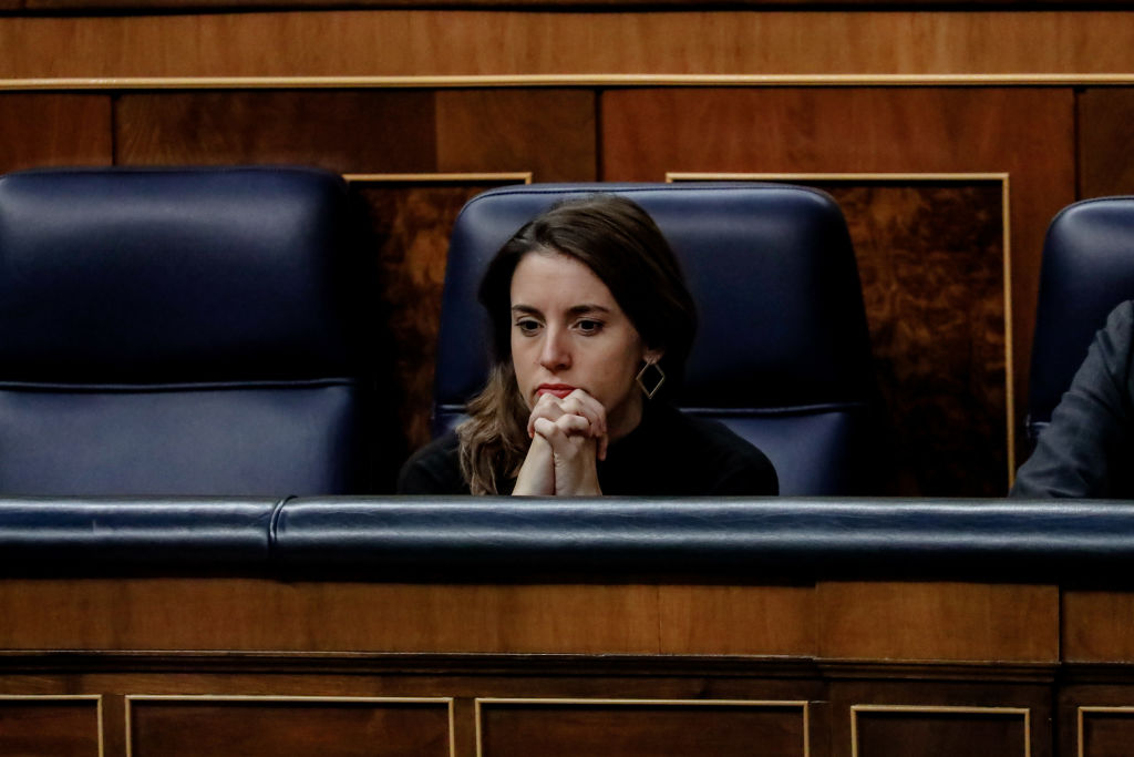 MADRID, SPAIN - NOVEMBER 24: The Minister of Equality, Irene Montero, during a plenary session in the Congress of Deputies, on 24 November, 2022 in Madrid, Spain. The General State Budget (PGE) for 2023 arrived at the Plenary Session of the Congress of Deputies on Monday, November 21, to undergo the last vote before passing to the Senate. The Plenary of the Congress approves the draft General State Budget for 2023, predictably with a large majority and with the incorporation of more than two hundred amendments, a text that will then have to continue its processing in the Senate. For the moment, the bill has already secured the 174 votes it needs to be approved by simple majority, PSOE (120), Unidas Podemos (33), PNV (6), EH Bildu (5), PDeCAT (4), Coalicion Canaria (2), Mas Pais (2), Compromis (1) and PRC (1). If ERC confirms its support to the bills, it will increase the majority to 187 votes in favor. The Congress celebrates, after finishing the Plenary dedicated to the General Budgets of the State for 2023, a new session in which the debate of taking into consideration of the bill of the PSOE and Podemos to end the crime of sedition for which the leaders of the 'proces' were condemned has been scheduled. In addition, the tax on banking, energy and large fortunes will be voted. (Photo By Carlos Lujan/Europa Press via Getty Images)