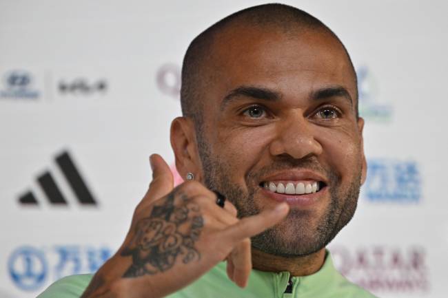 Brazil's defender #13 Dani Alves gives a press conference at the Qatar National Convention Center (QNCC) in Doha on December 1, 2022, on the eve of the Qatar 2022 World Cup football match between Cameroon and Brazil. (Photo by NELSON ALMEIDA / AFP)